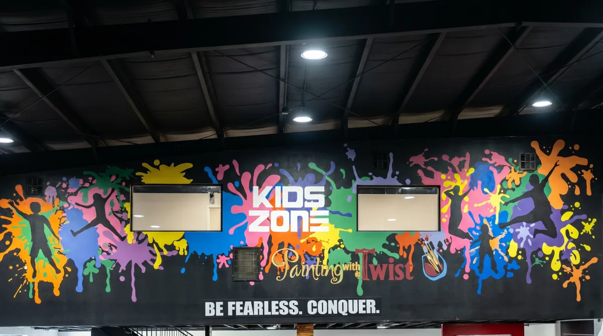 The colorful Kidz Zone room at T3 Fitness